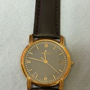 Movado Black Dial Gold Case Watch